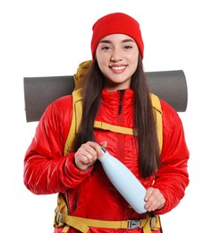 Smiling young woman with backpack and thermo bottle on white background. Active tourism