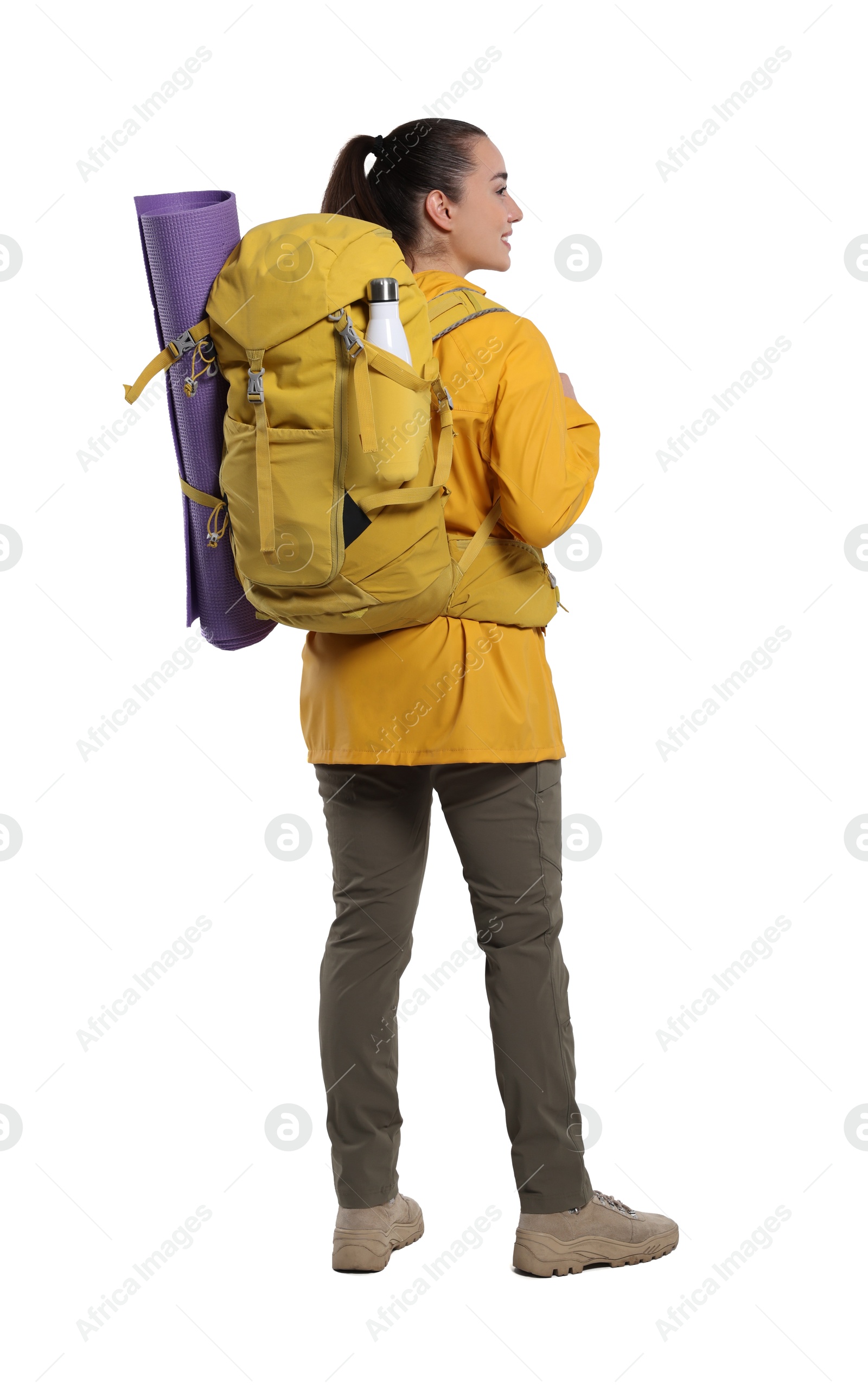 Photo of Young woman with backpack and mat on white background. Active tourism