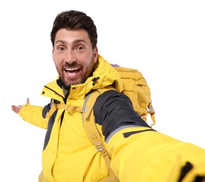 Photo of Happy man with backpack taking selfie on white background. Active tourism