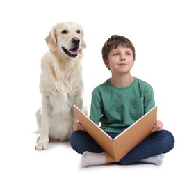 Photo of Boy reading book with his cute dog on white background