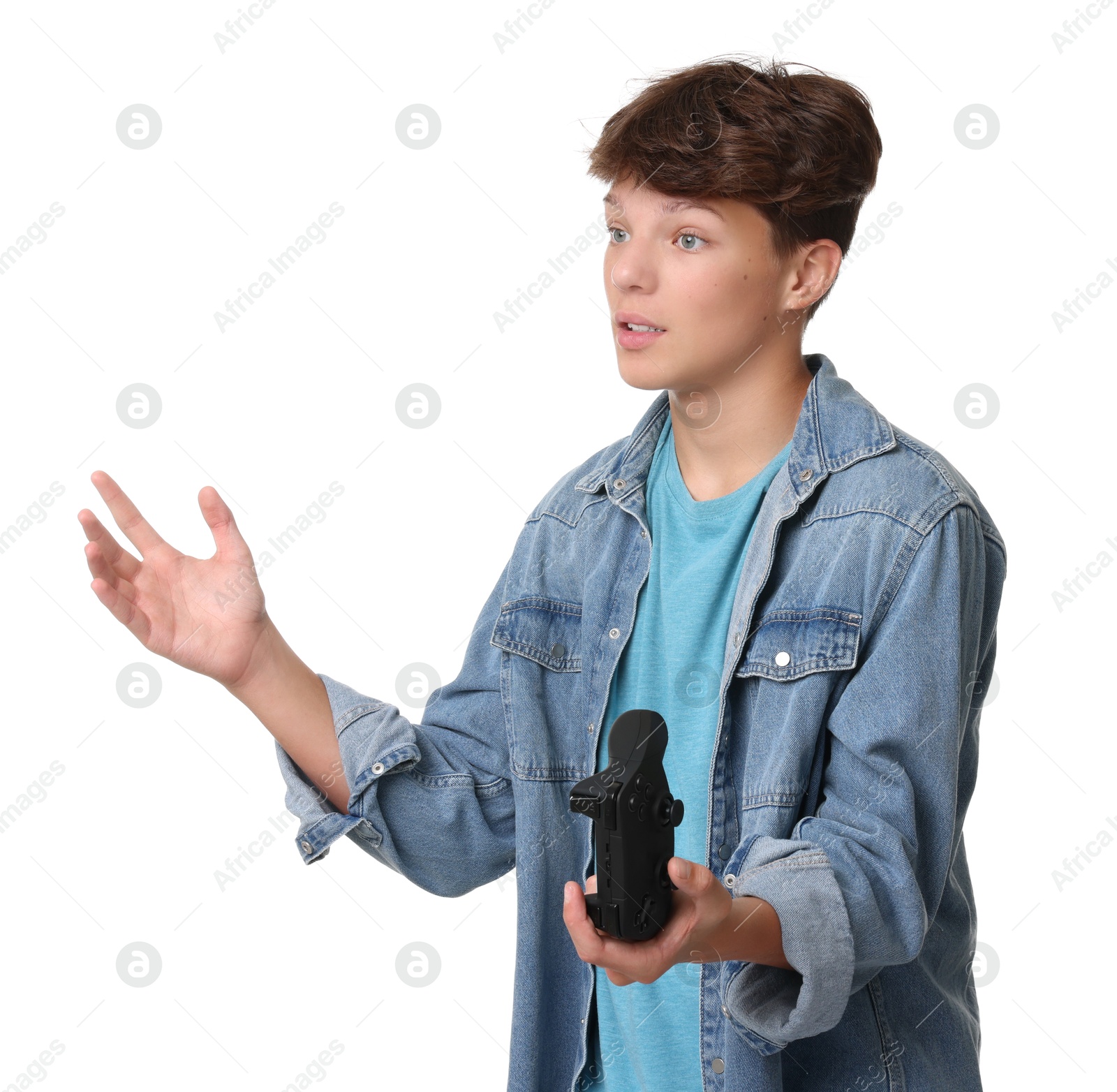 Photo of Teenage boy with controller on white background