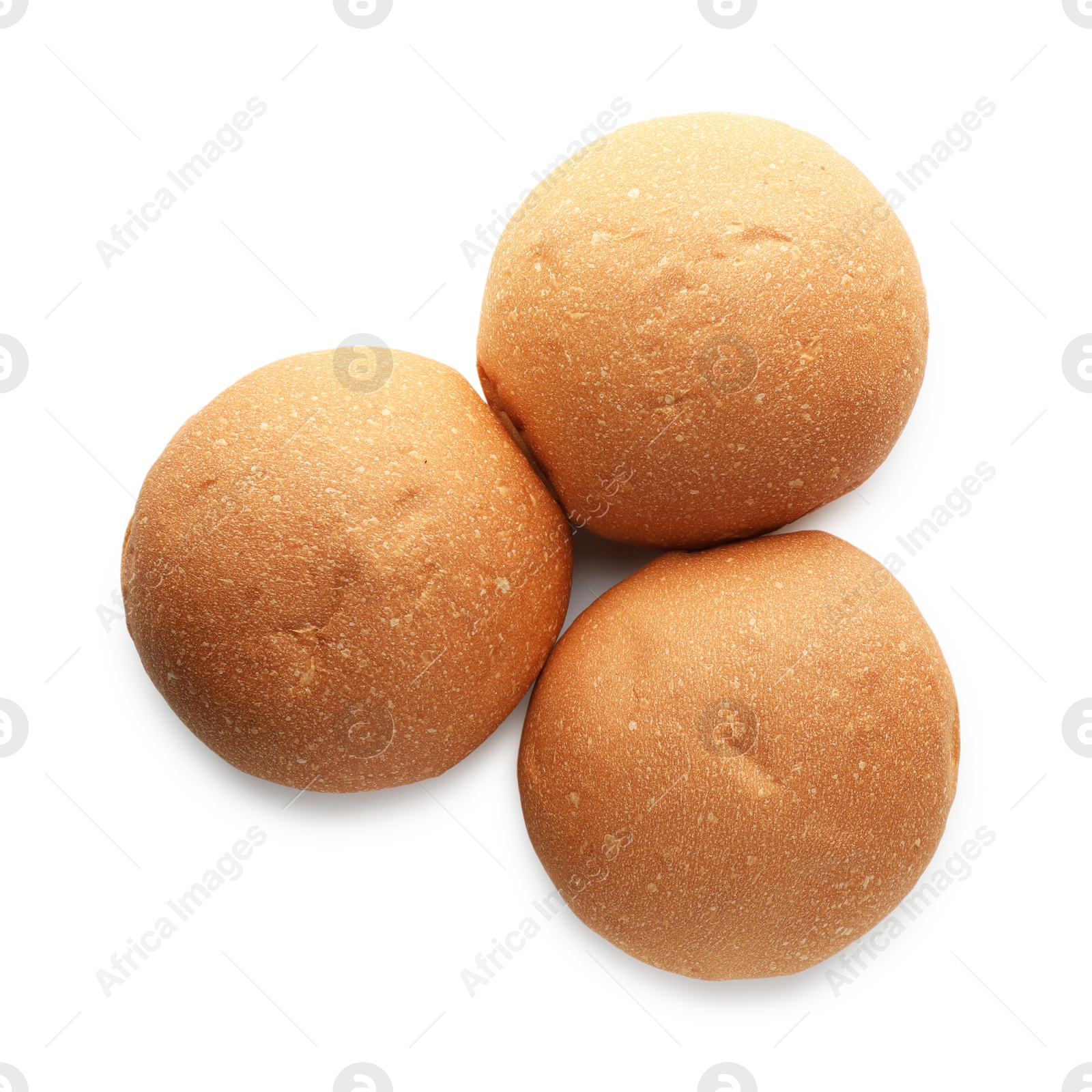 Photo of Three fresh tasty buns isolated on white, top view