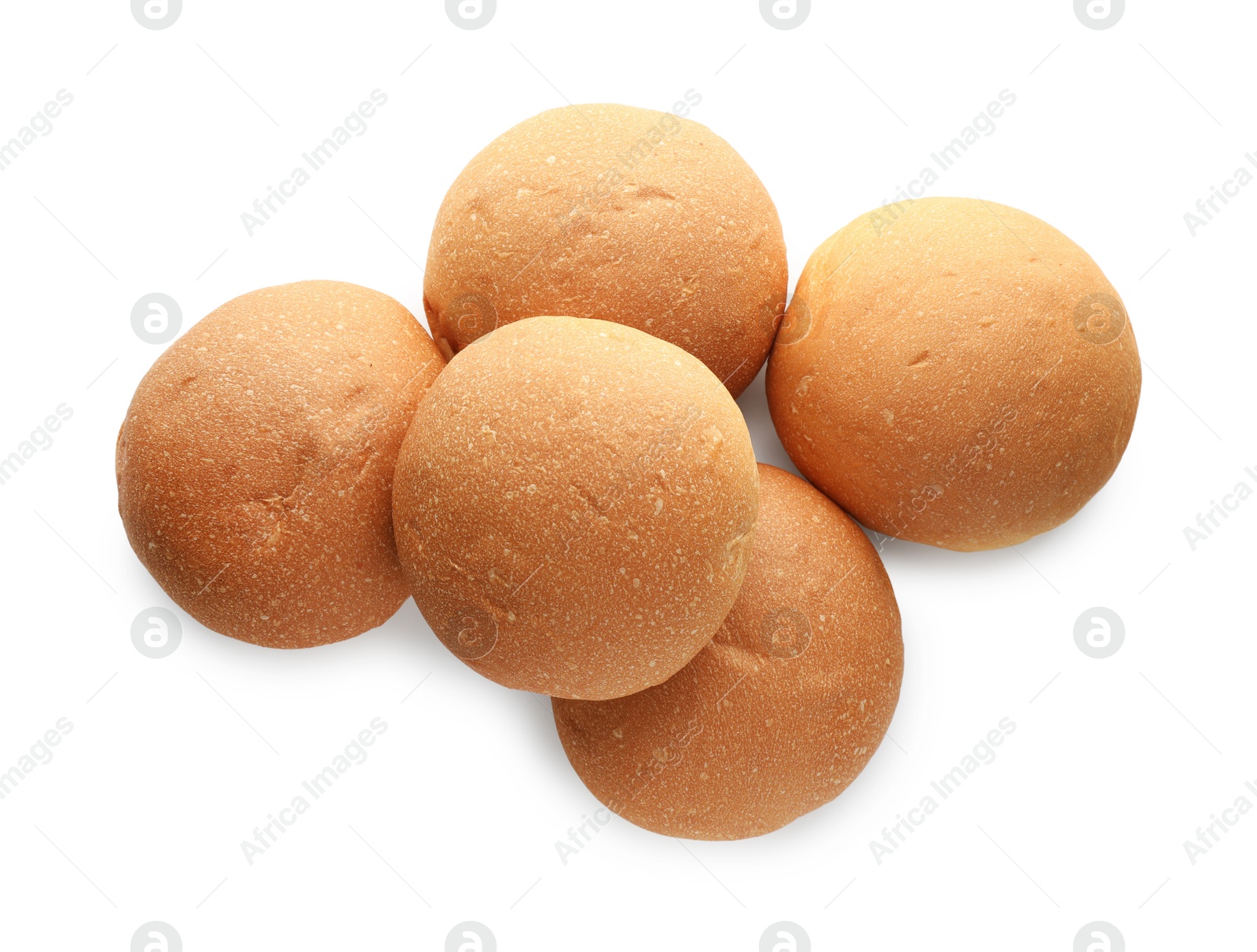 Photo of Many fresh tasty buns isolated on white, top view