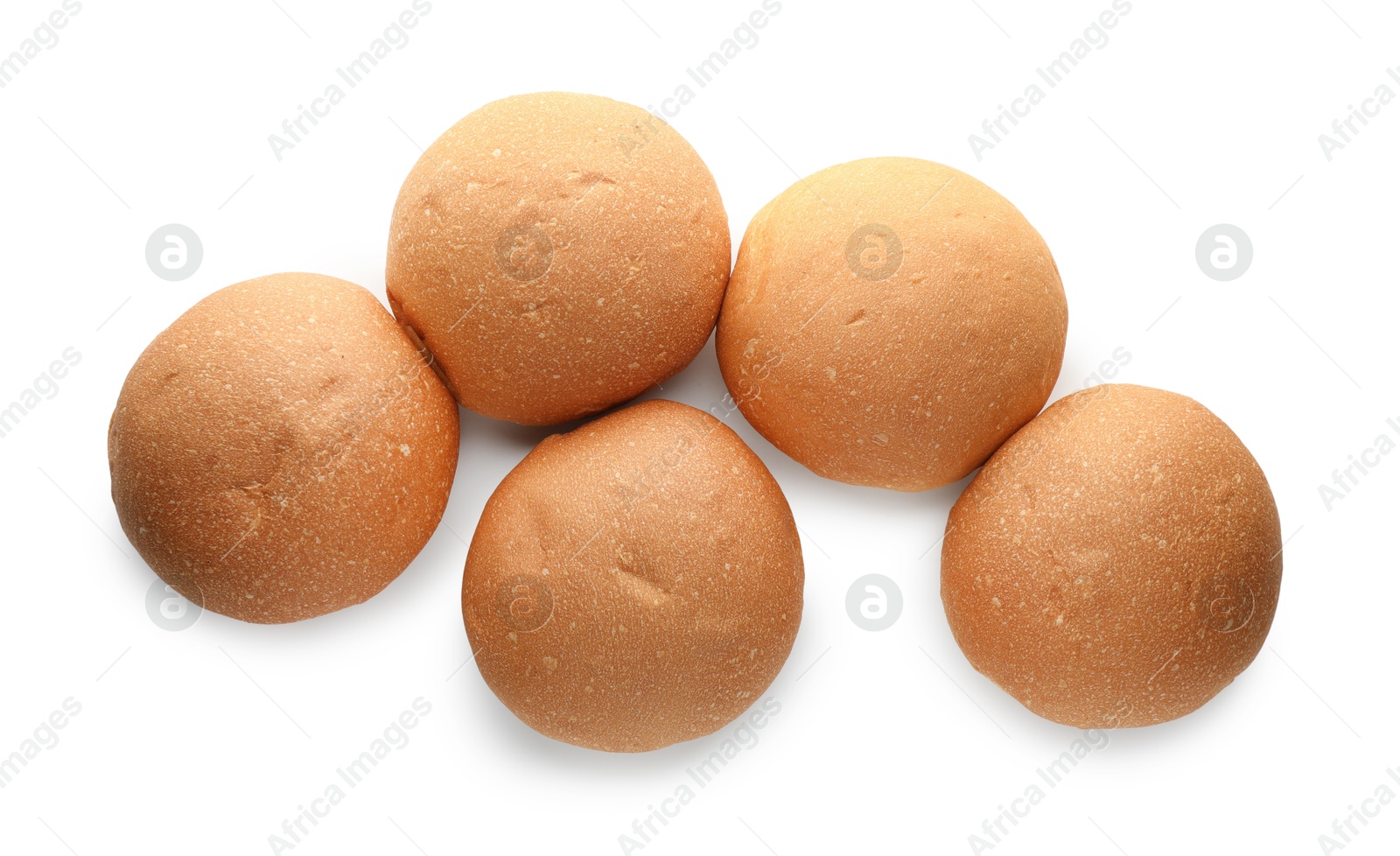 Photo of Many fresh tasty buns isolated on white, top view