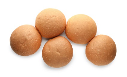 Photo of Many fresh tasty buns isolated on white, top view