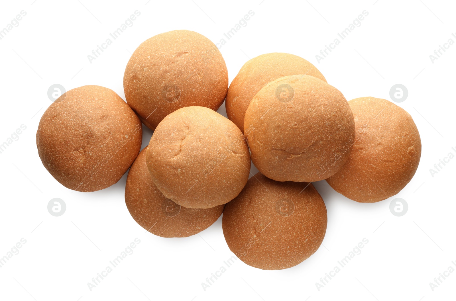 Photo of Many fresh tasty buns isolated on white, top view