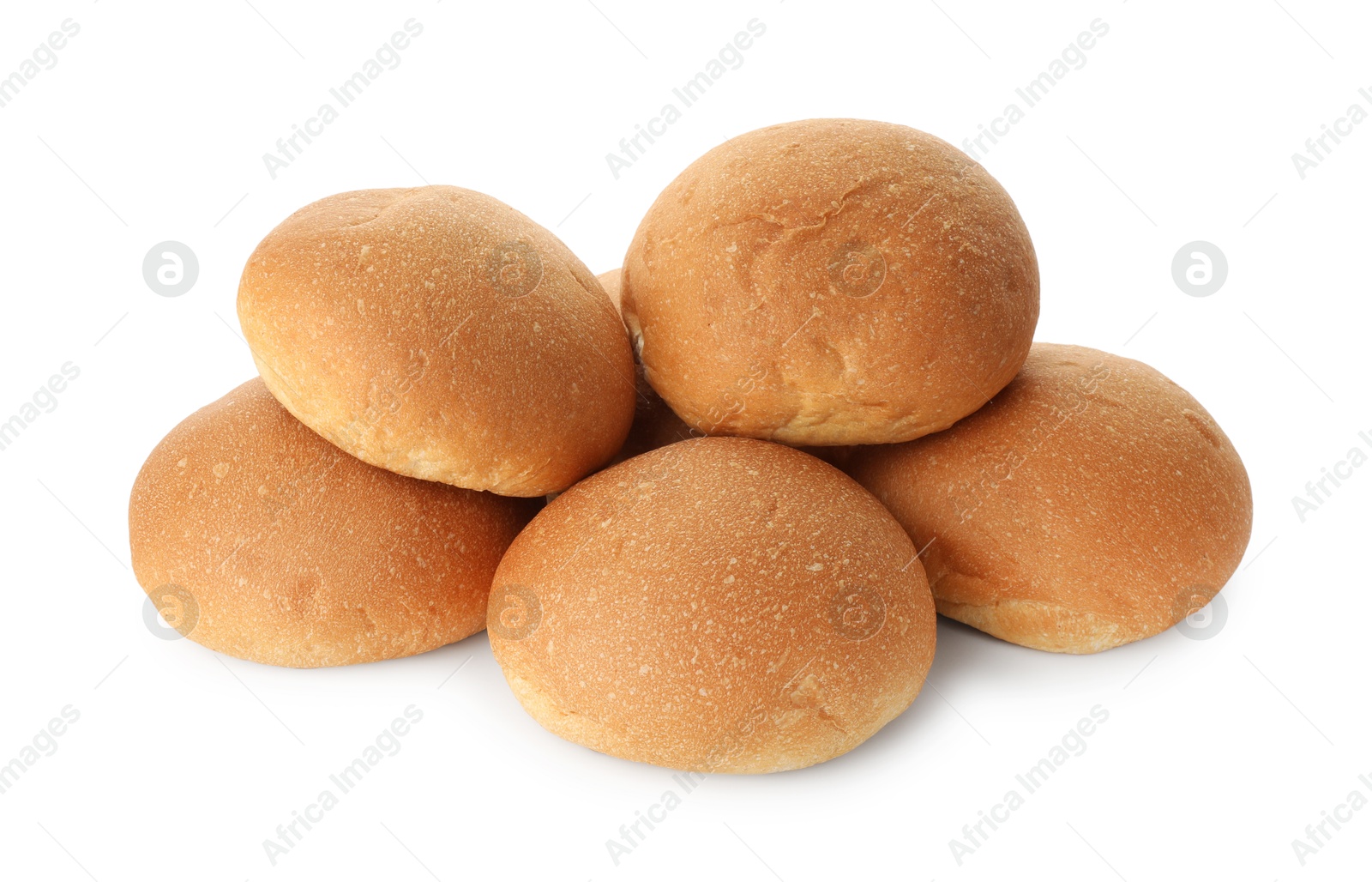 Photo of Many fresh tasty buns isolated on white