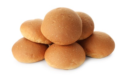 Photo of Many fresh tasty buns isolated on white