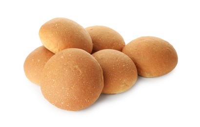 Photo of Many fresh tasty buns isolated on white