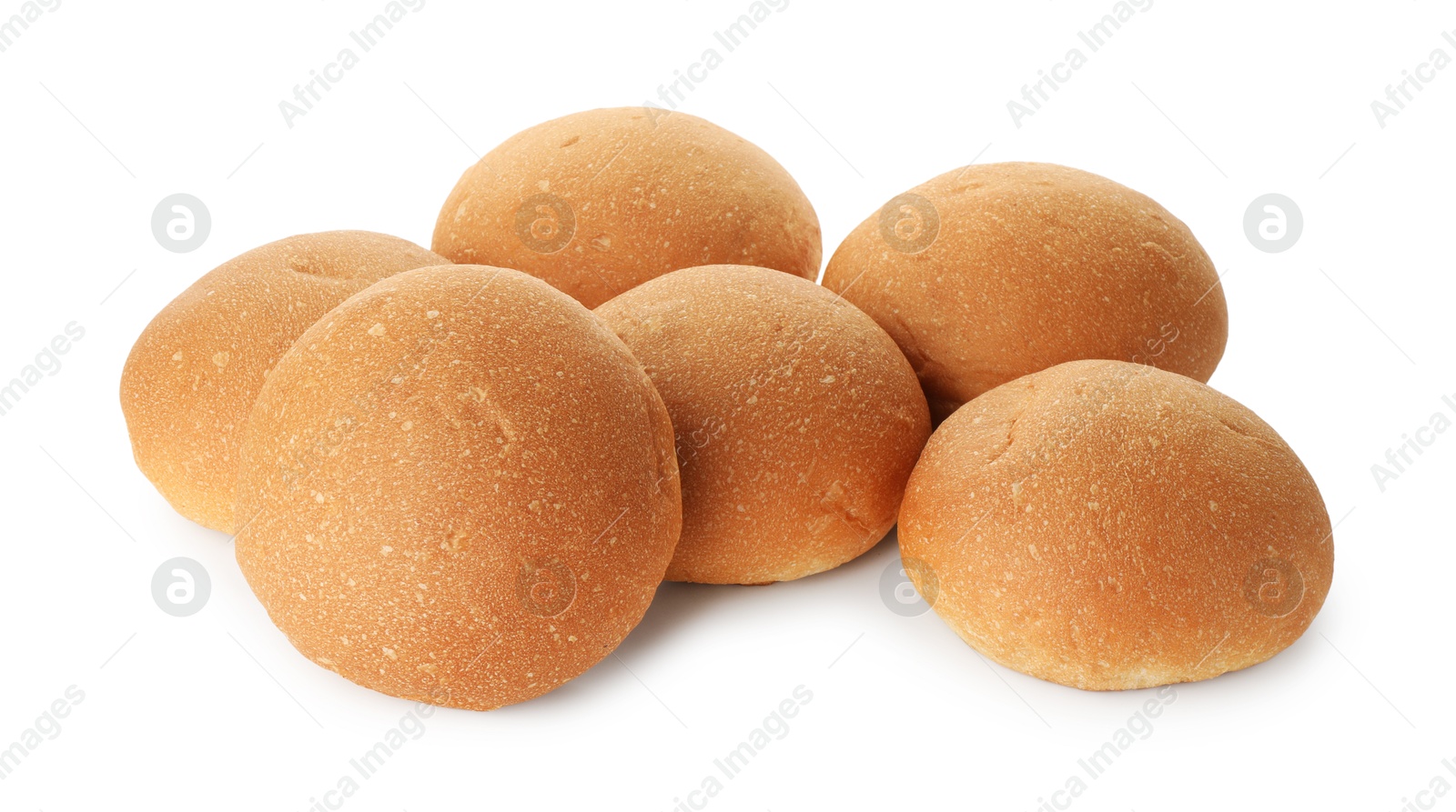 Photo of Many fresh tasty buns isolated on white