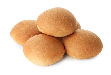 Photo of Many fresh tasty buns isolated on white