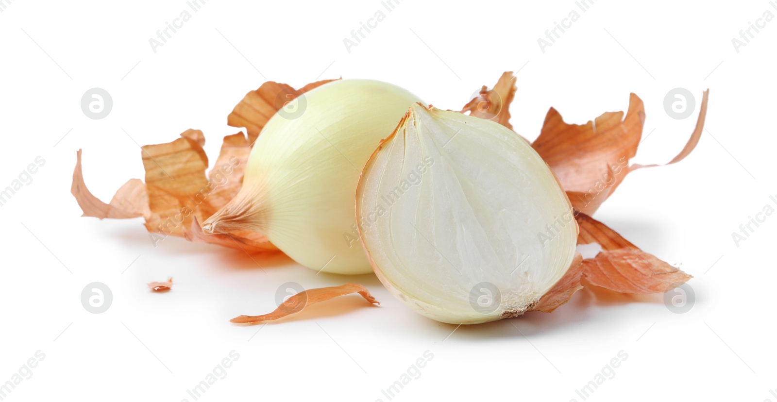 Photo of Fresh onions with peels isolated on white