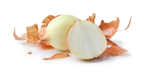 Photo of Fresh onions with peels isolated on white