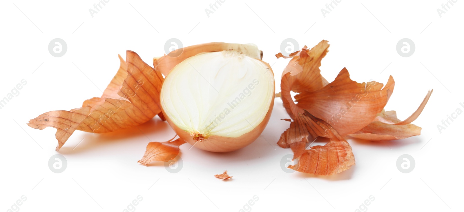 Photo of Halves of fresh onion with peels isolated on white