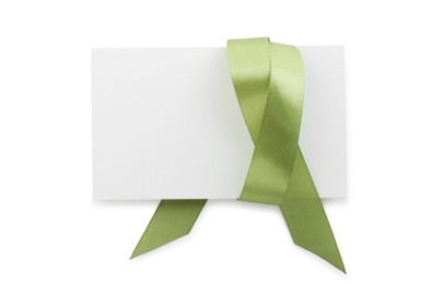 Photo of Blank card and olive ribbon isolated on white, top view