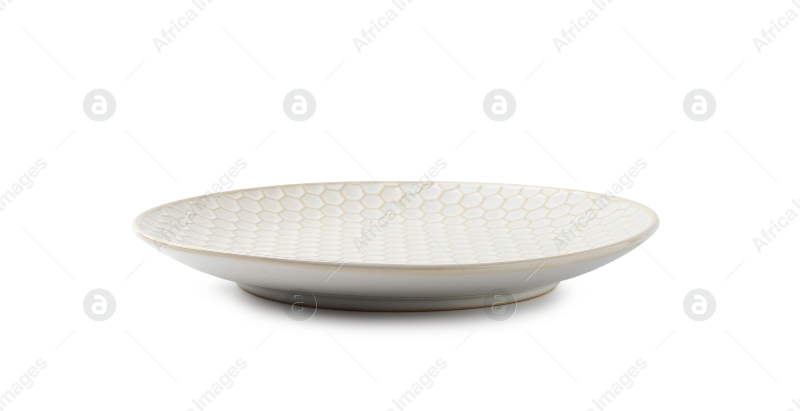 Photo of One empty ceramic plate isolated on white