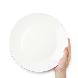 Woman with empty ceramic plate on white background, top view