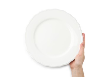 Photo of Woman with empty ceramic plate on white background, top view