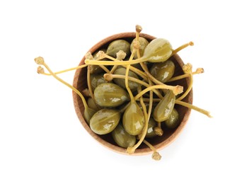 Capers in bowl isolated on white, top view