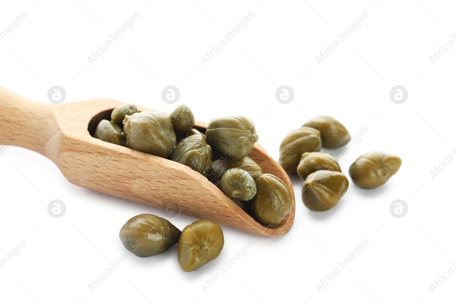 Photo of Wooden scoop and capers on white background