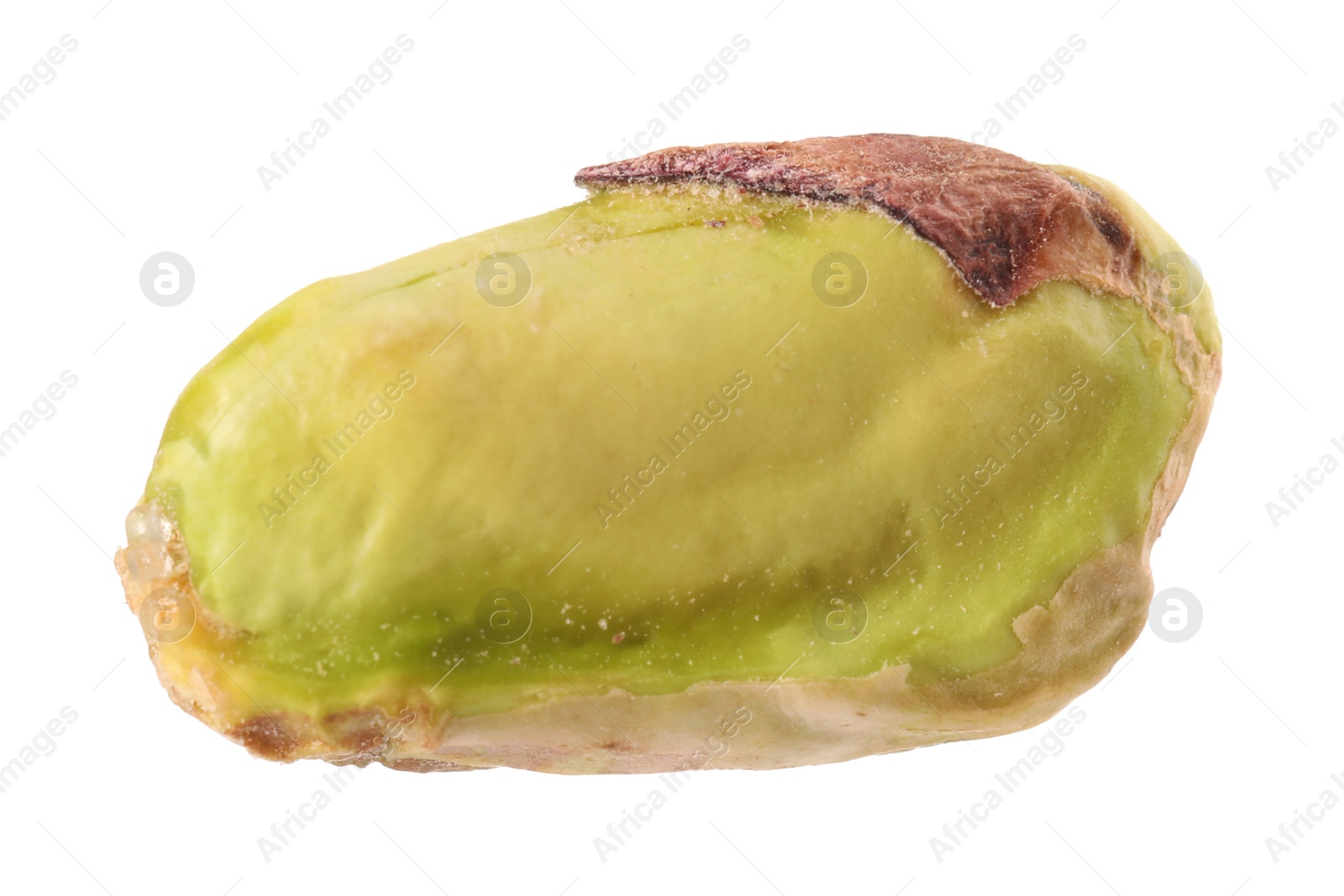 Photo of One peeled pistachio nut isolated on white