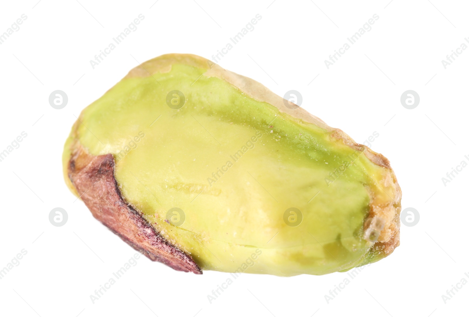 Photo of One peeled pistachio nut isolated on white