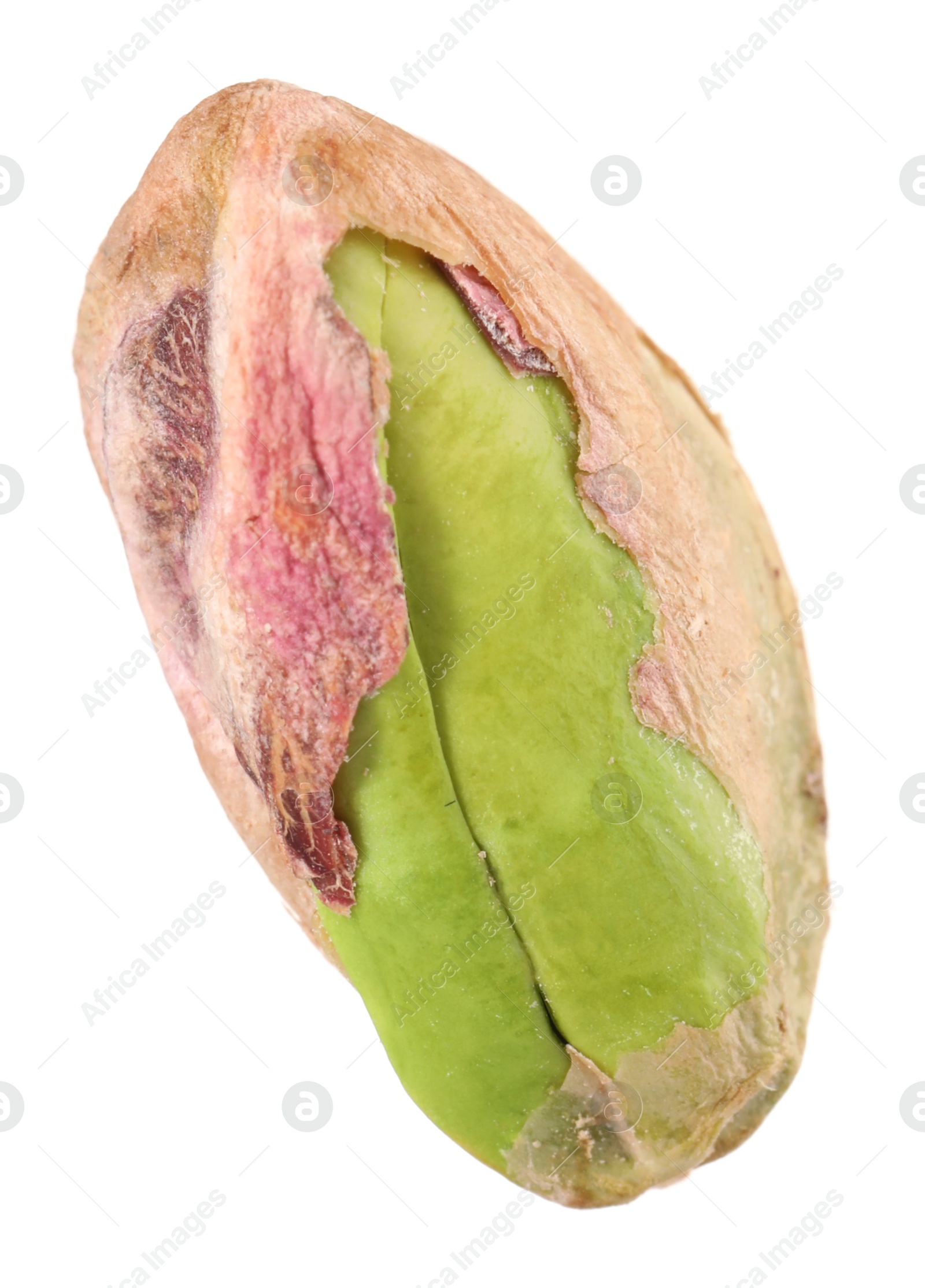 Photo of One peeled pistachio nut isolated on white