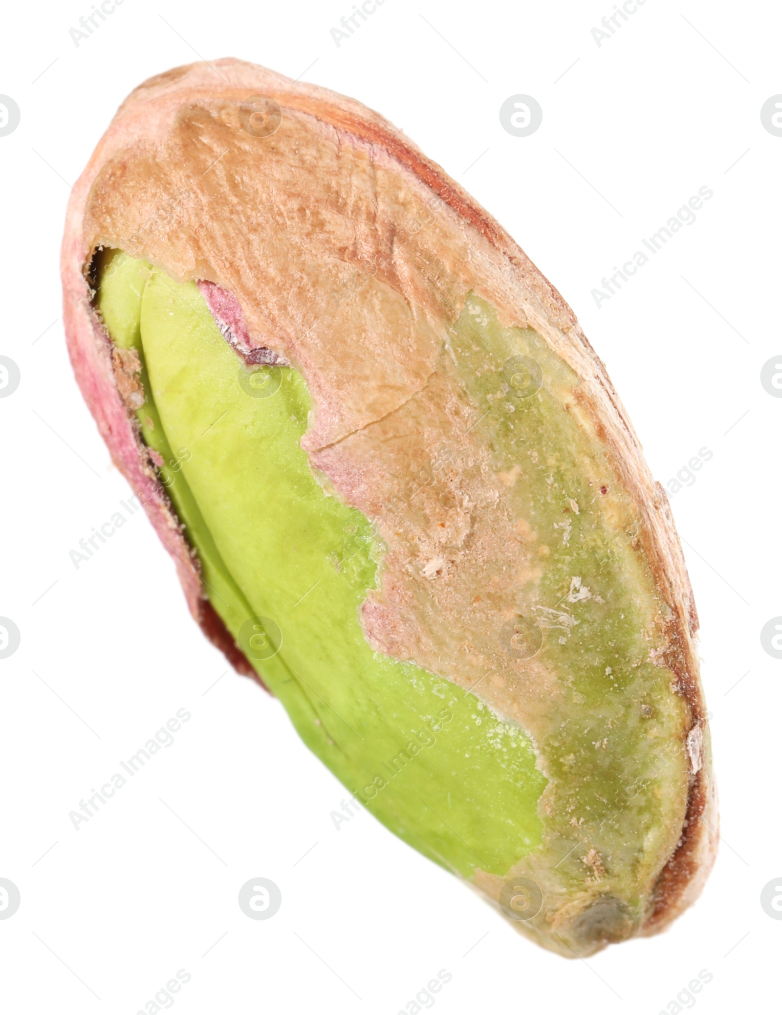 Photo of One peeled pistachio nut isolated on white