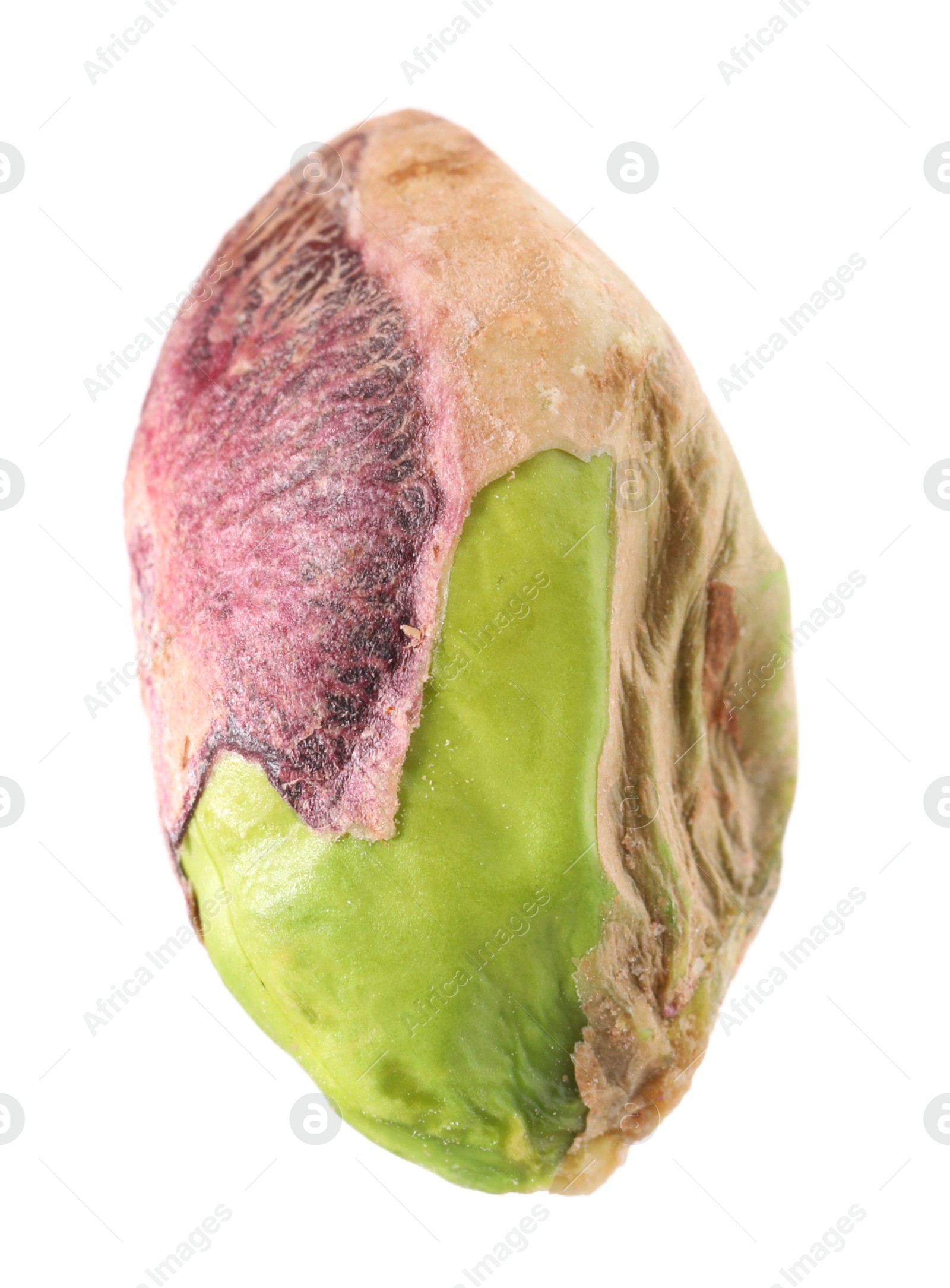 Photo of One peeled pistachio nut isolated on white