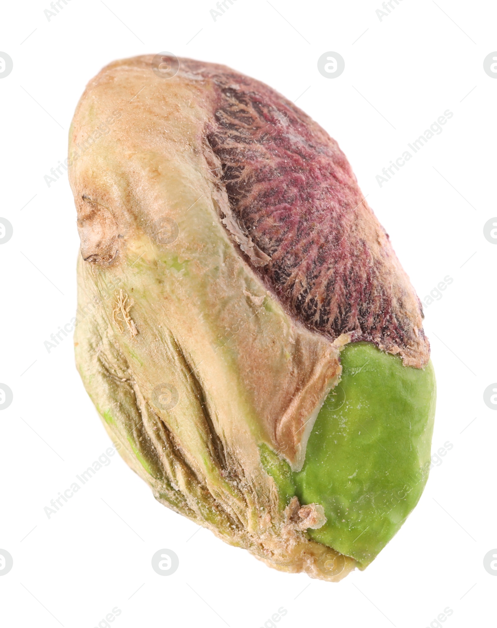 Photo of One peeled pistachio nut isolated on white