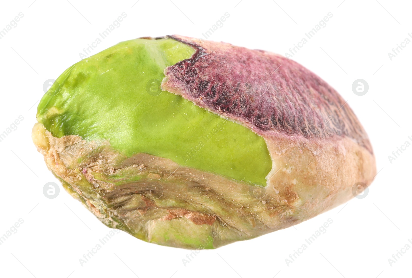 Photo of One peeled pistachio nut isolated on white