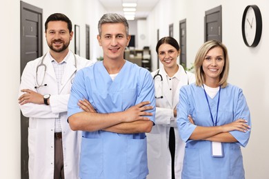 Photo of Portrait of smiling healthcare workers in hospital