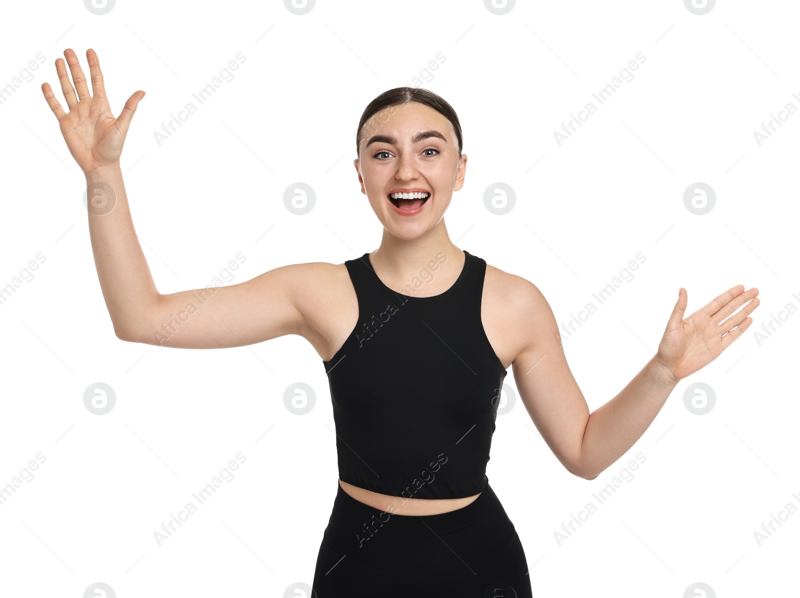 Photo of Beautiful woman in sportswear running on white background