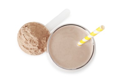 Photo of Delicious protein shake in glass and scoop with powder isolated on white, top view