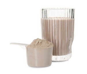 Delicious protein shake in glass and scoop with powder isolated on white