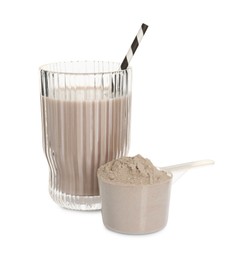 Photo of Delicious protein shake in glass and scoop with powder isolated on white