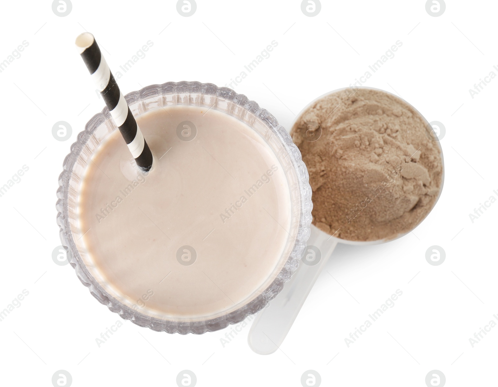 Photo of Delicious protein shake in glass and scoop with powder isolated on white, top view