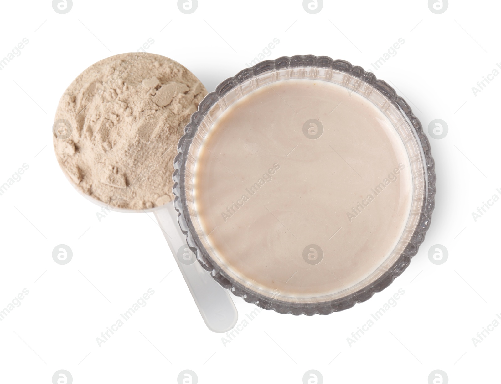 Photo of Delicious protein shake in glass and scoop with powder isolated on white, top view