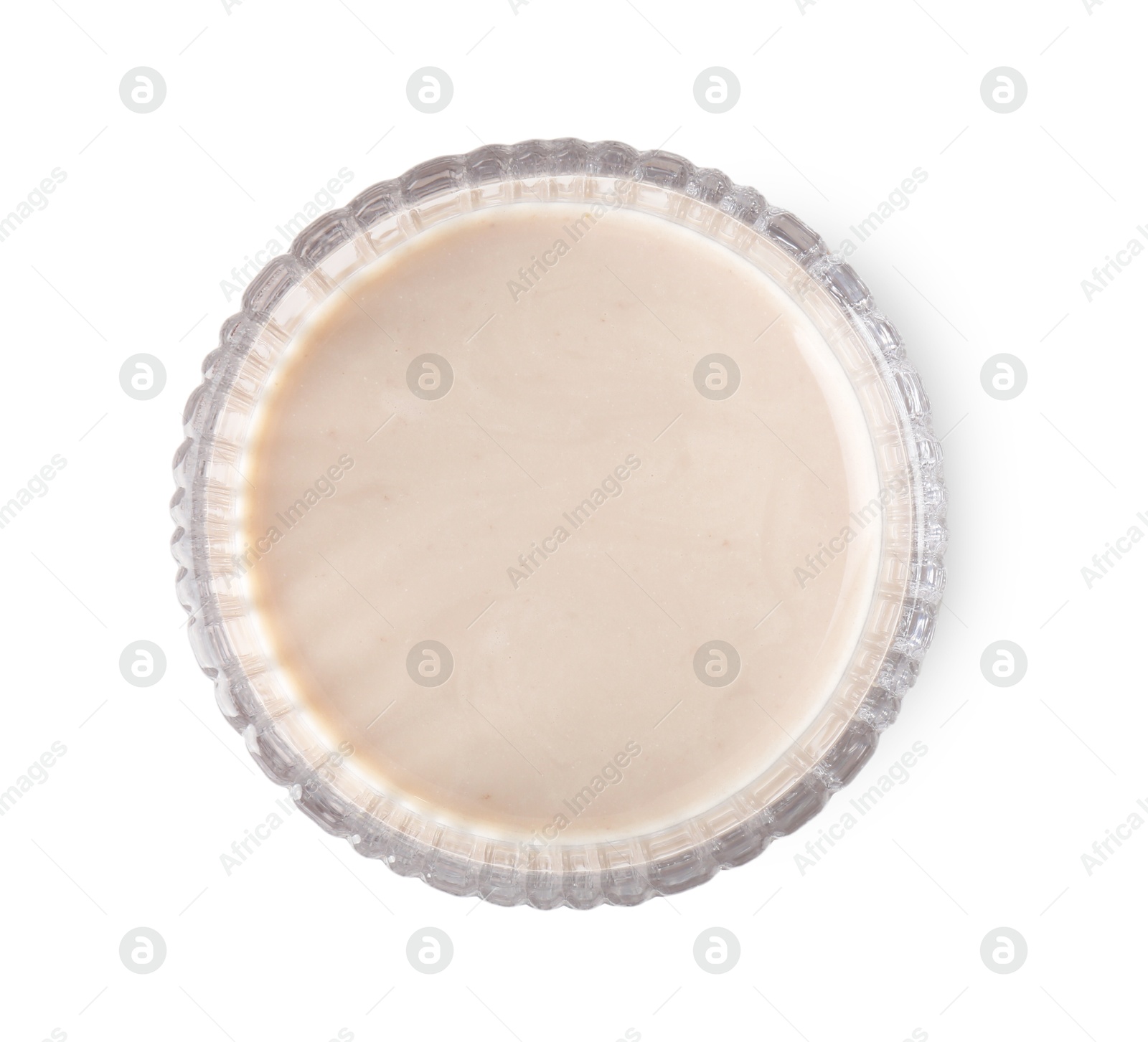 Photo of Delicious protein shake in glass isolated on white, top view