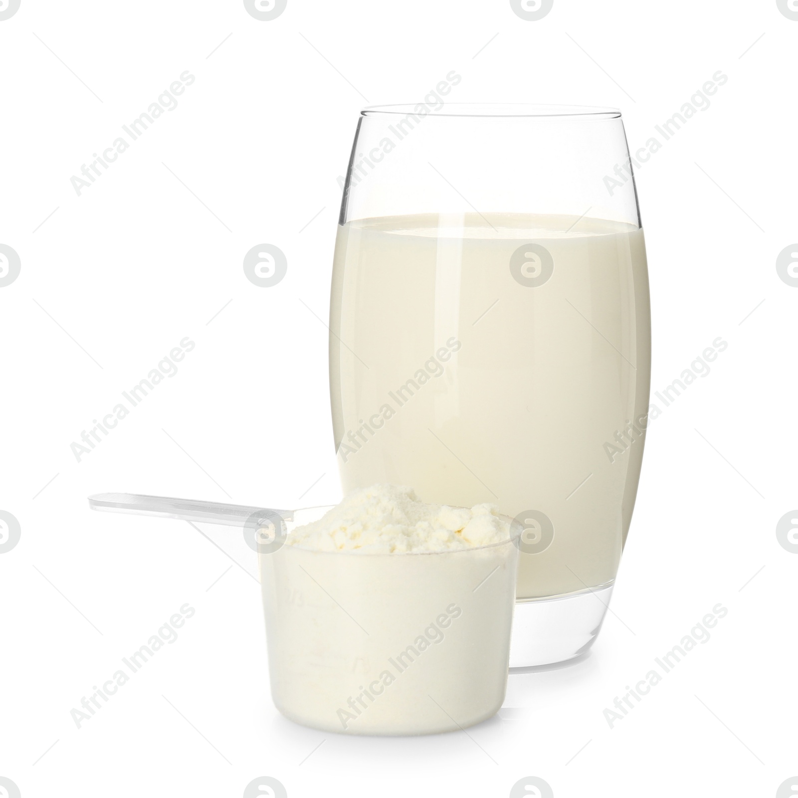 Photo of Delicious protein shake in glass and scoop with powder isolated on white