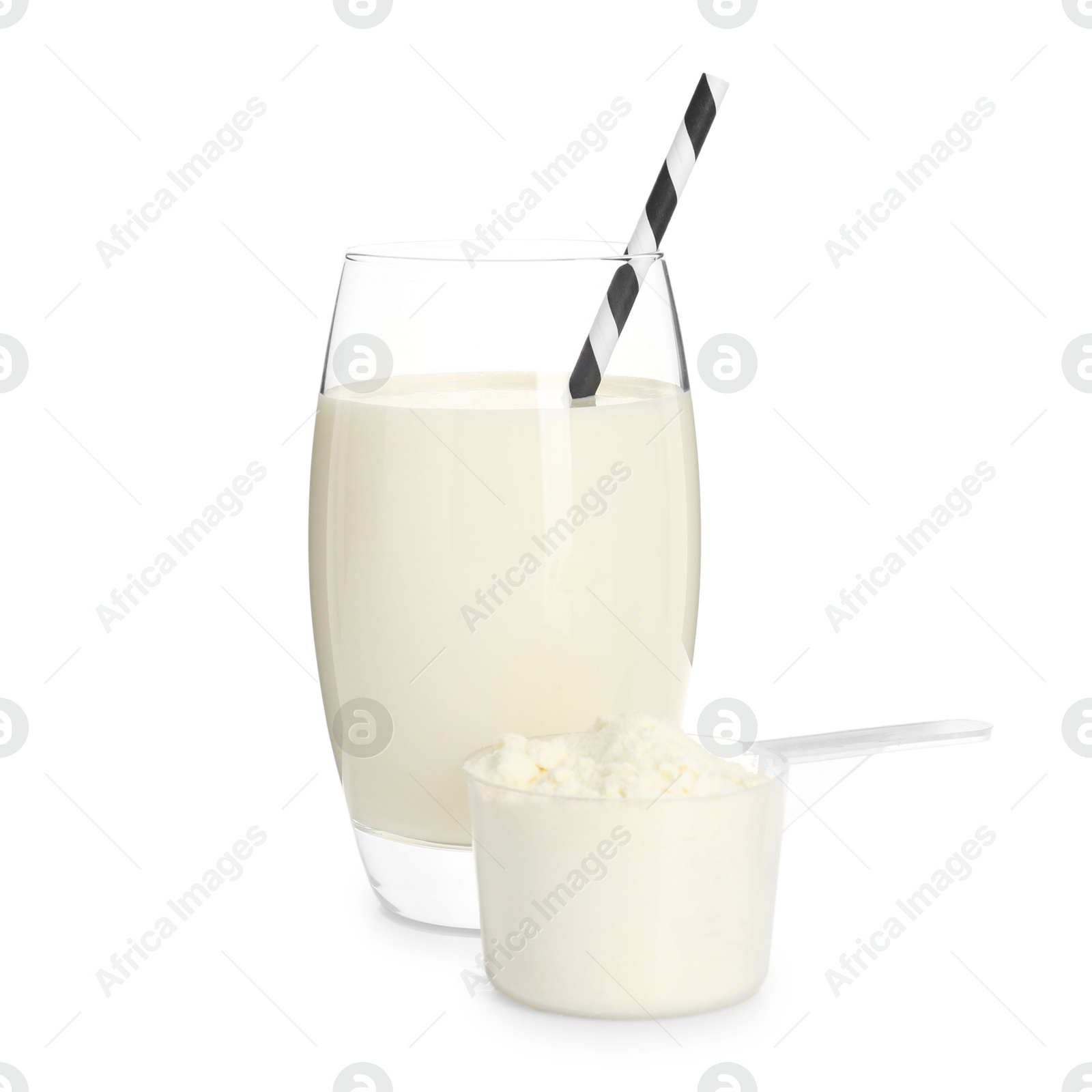 Photo of Delicious protein shake in glass and scoop with powder isolated on white