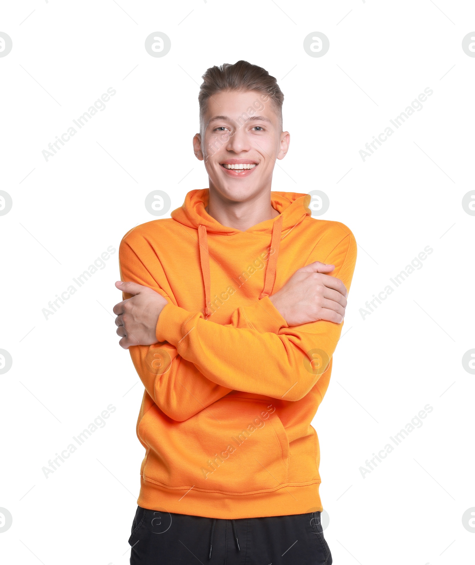 Photo of Young man hugging himself on white background