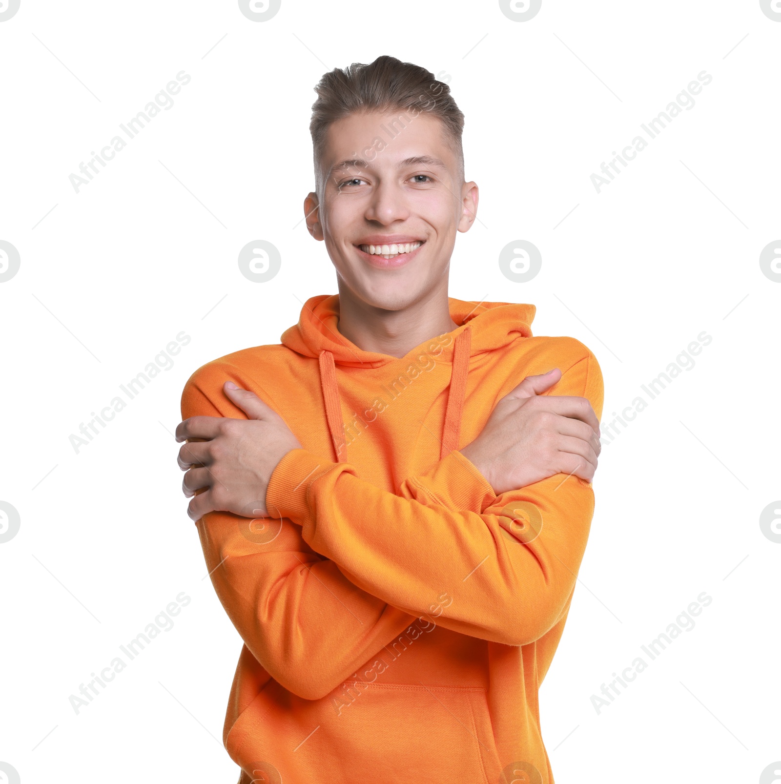 Photo of Young man hugging himself on white background