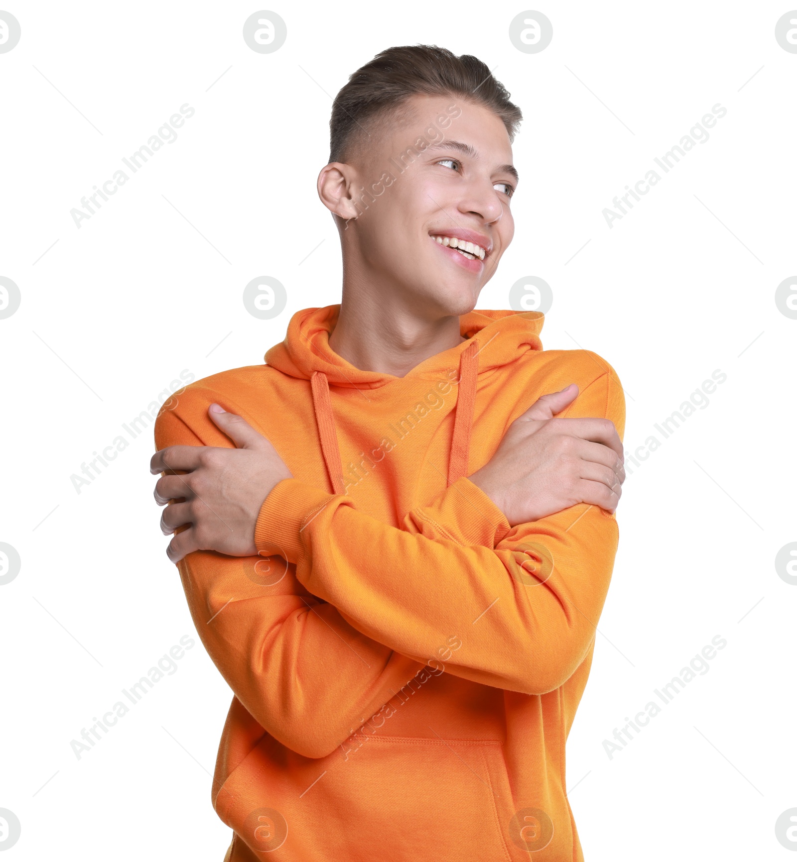 Photo of Young man hugging himself on white background