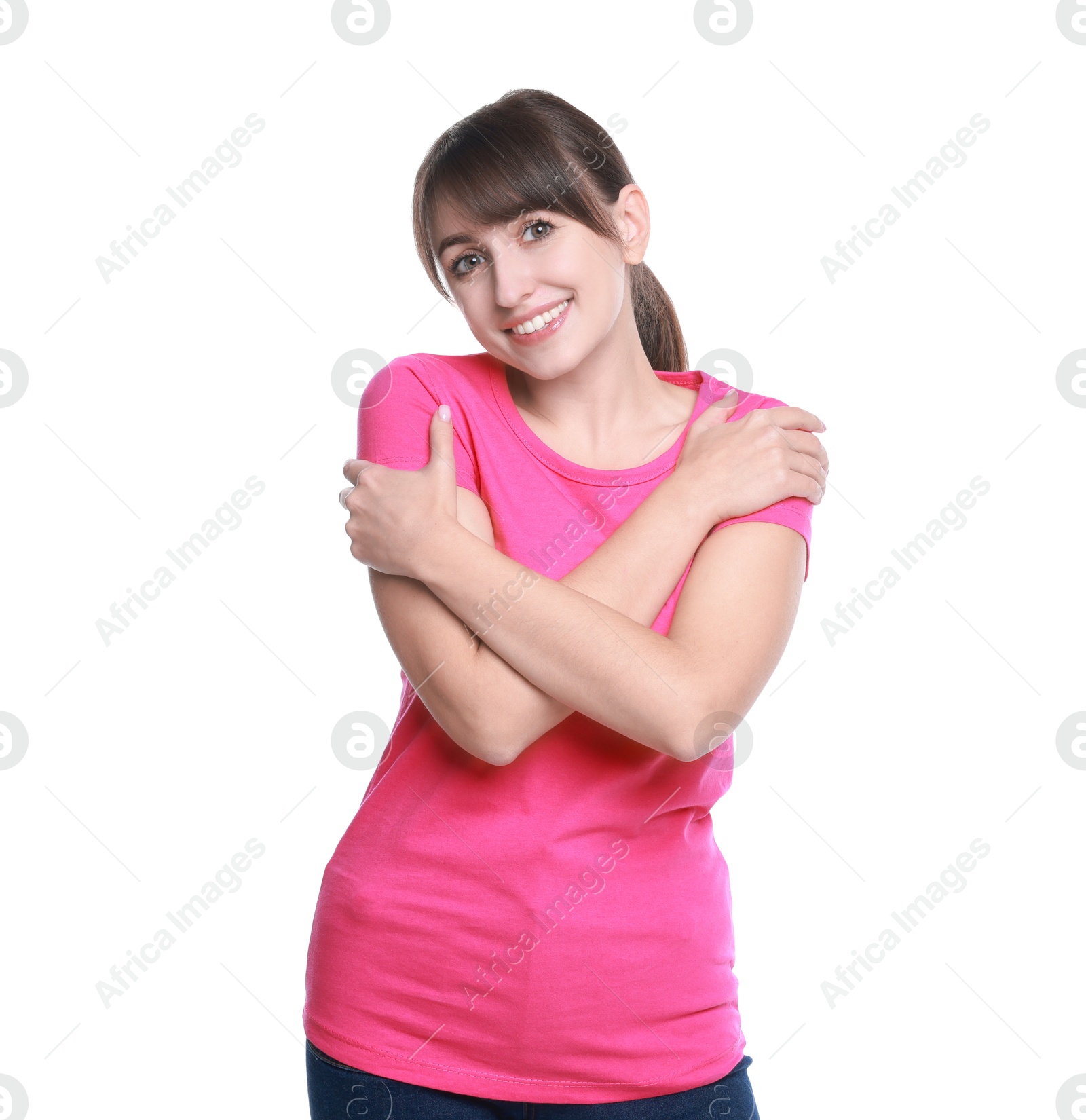 Photo of Young woman hugging himself on white background