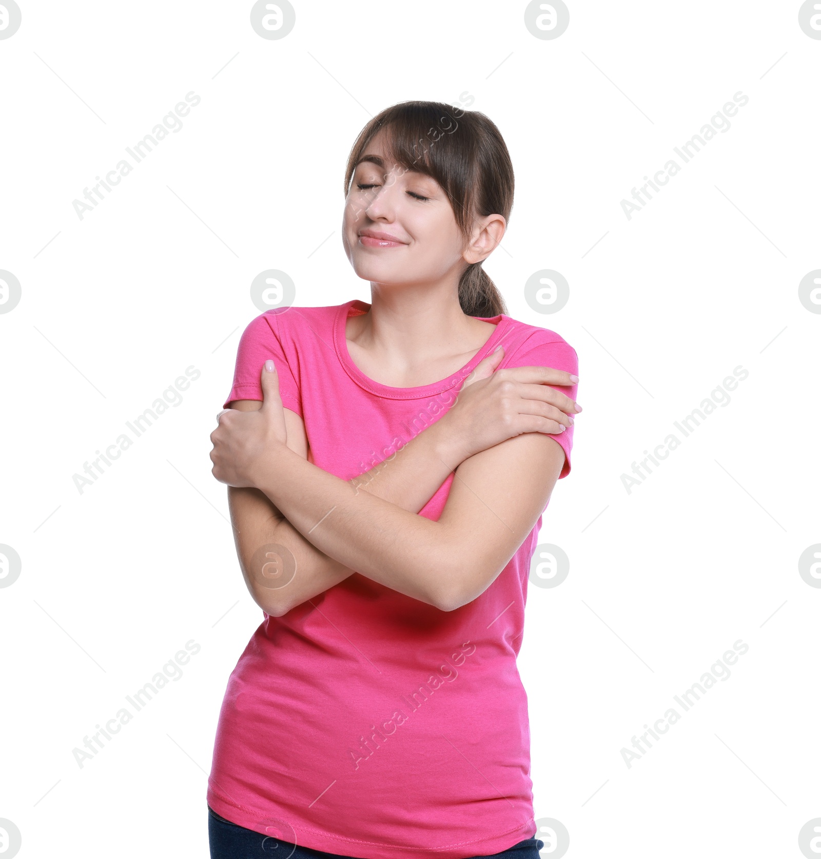 Photo of Young woman hugging himself on white background