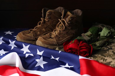 Photo of Veterans day. American flag, roses and military uniform