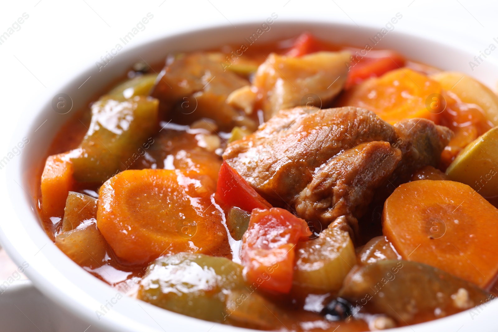 Photo of Delicious stew with vegetables in bowl, closeup