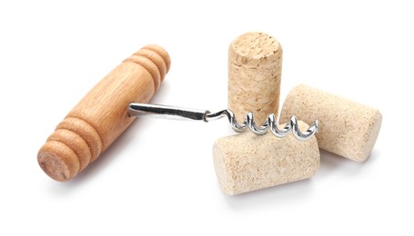 Photo of Corkscrew with wooden handle and corks isolated on white