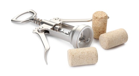 Photo of Wing corkscrew and corks isolated on white